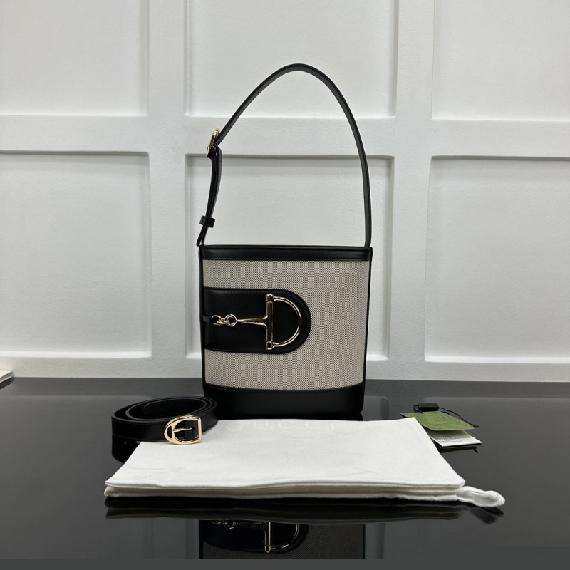 G*u*i top handle bags